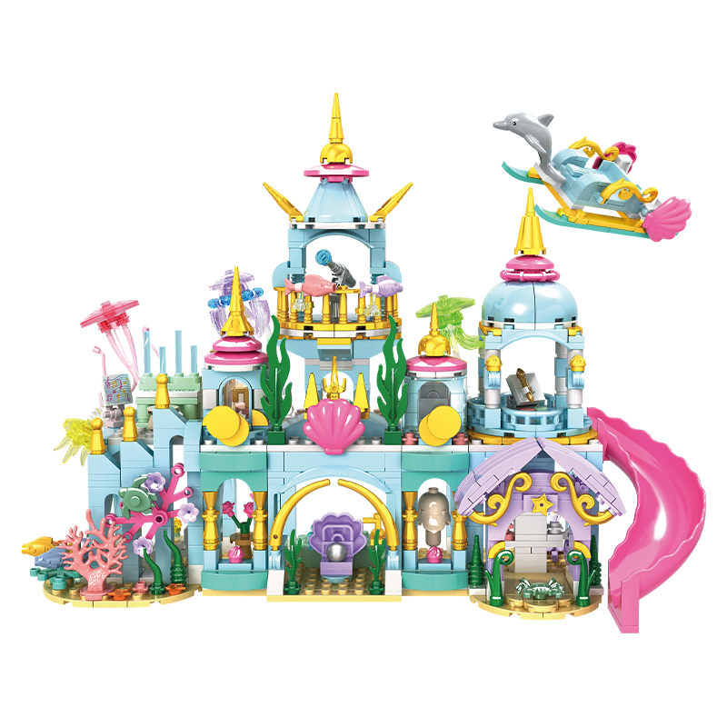 Toy castle set with colorful architecture and sea-themed decorations on a white background