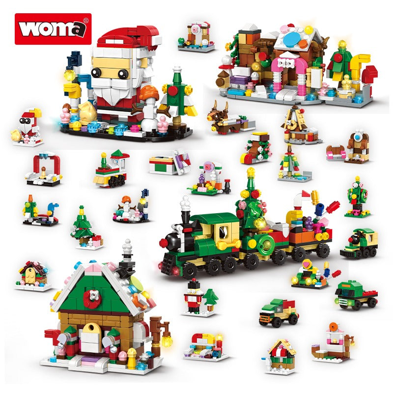 Collection of colorful building blocks with a train and festive structures on a white background, featuring the Woma brand.